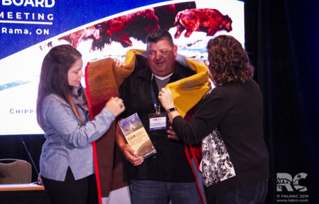Chiefs Kelly LaRocca and Leah George-Wilson present a ceremonial blanket and the Trailblazer Award to Dean Bear. LAB AGM 2019